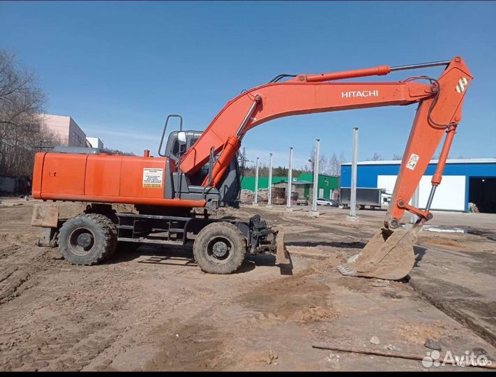 Услуги колёсного экскаватора в Байкальске