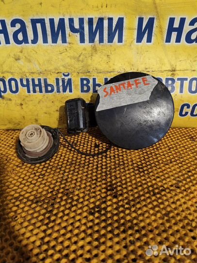 Лючок бензобака Hyundai Santa-fe