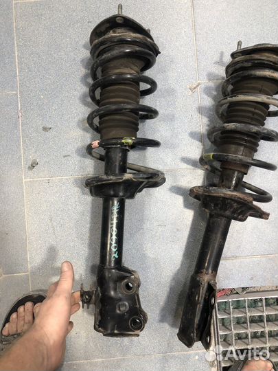 Стойка амортизатора передняя