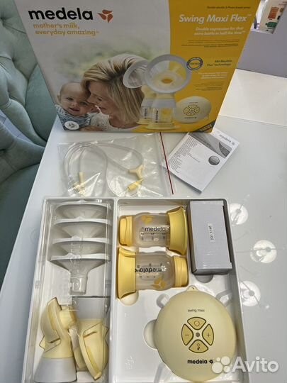 Молокоотсос medela swing maxi flex
