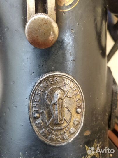 Старинная швейная машина сингер