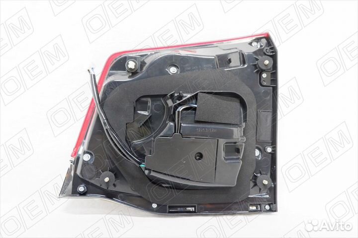 Фонарь левый задний в крышку багажника 560014