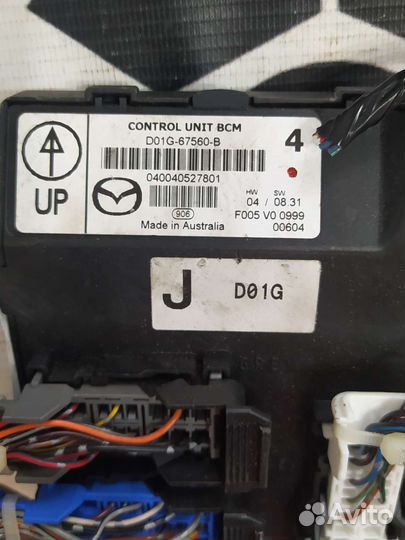 Блок комфорта для Mazda Demio D01G67560B