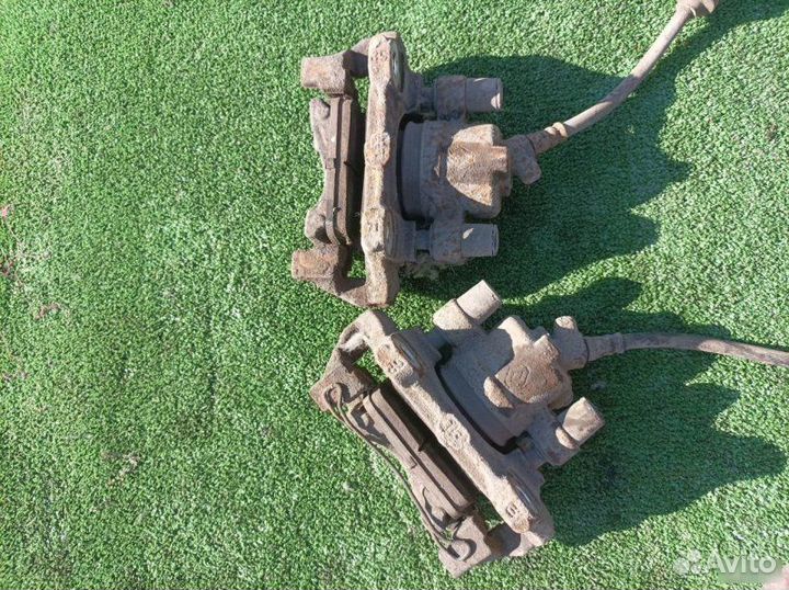 Суппорт тормозной передний Renault Logan 2017