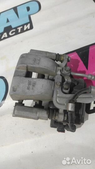 Суппорт тормозной задний правый Tesla Model 3