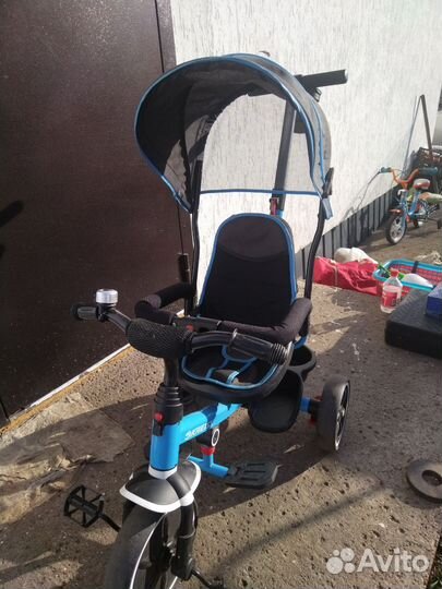 Детский велосипед с родительской ручкой б/у