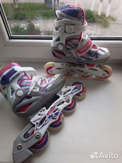 Роликовые коньки