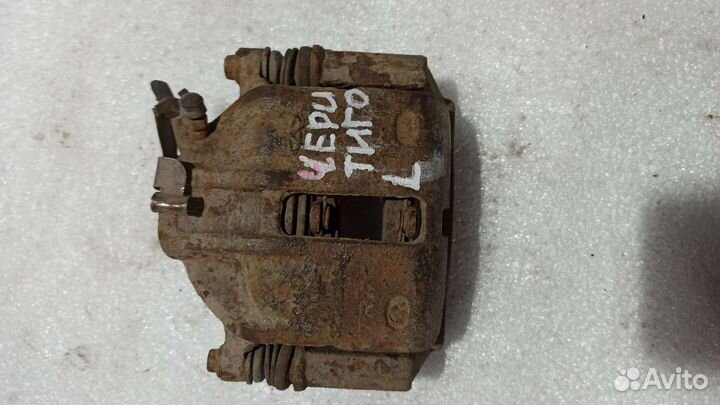 Суппорт левый Chery Tiggo t11