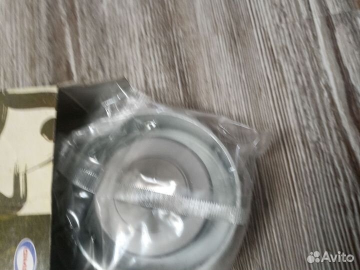 Натяжной ролик