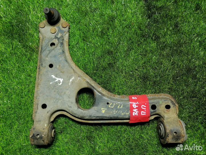 Передний правый рычаг Opel Astra H