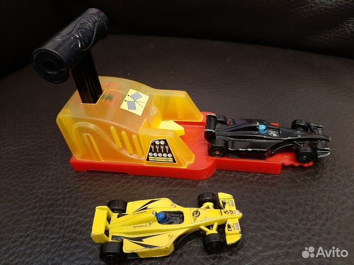 Детские игрушки машинки пакетом