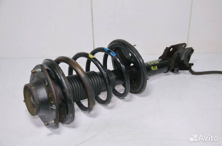 Стойка амортизатора передняя левая Kia Sportage 2