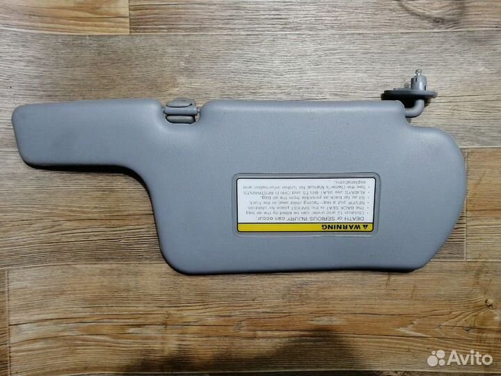 Козырек солнцезащитный левый Nissan Almera Classic