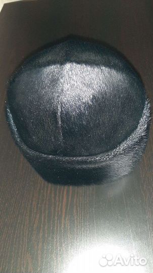 Женские меховые шапки