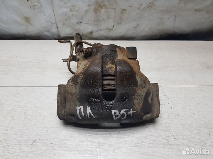 Суппорт передний левый Volkswagen Passat B5+