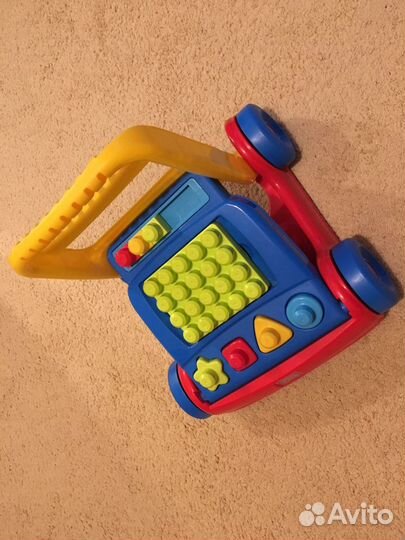 Каталка с конструктором для малыша mega bloks