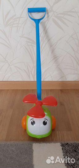 Игрушка каталка с ручкой