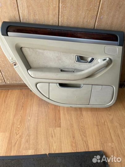 Обшивка двери З.Л. Audi A8 D3 4E0868065