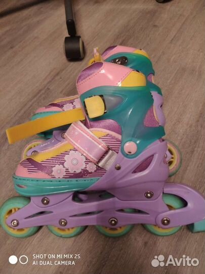 Роликовые коньки