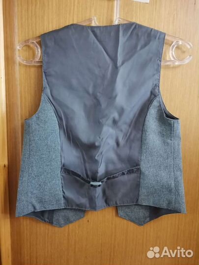 Жилетка новая