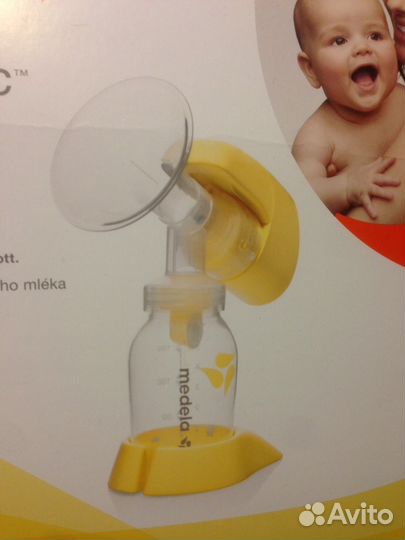 Молокоотсос Medela mini electric