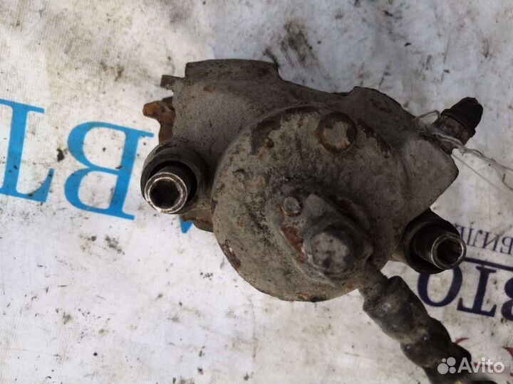 Передний левый тормозной суппорт Scoda Octavia A4