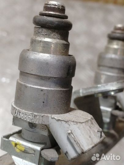 Форсунка двигателя Mitsubishi Lancer 10