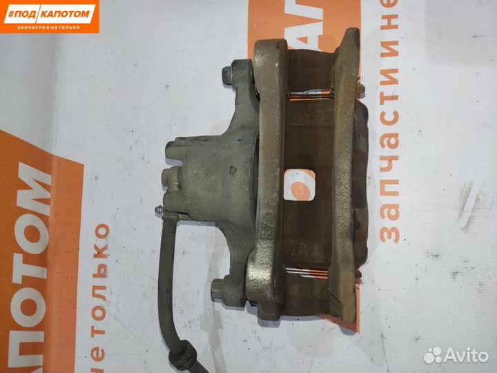 Суппорт тормозной передний левый Mitsubishi Lancer