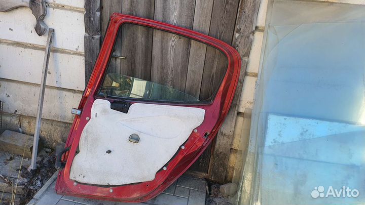 Дверь peugeot 206