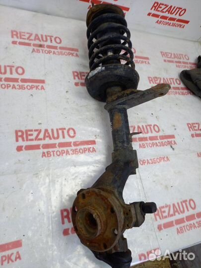 Амортизатор передний левый Daewoo Nexia