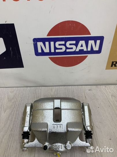 Суппорт тормозной перед Nissan almera classic B10