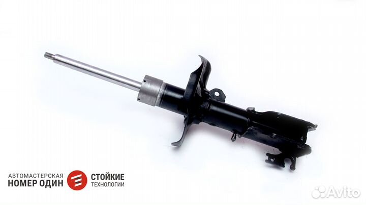 Амортизатор Mazda Familia Перед