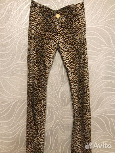 Джинсы клеш