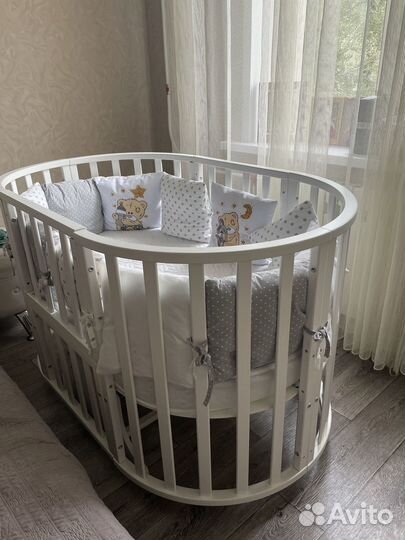 Детская кроватка с маятником круглая
