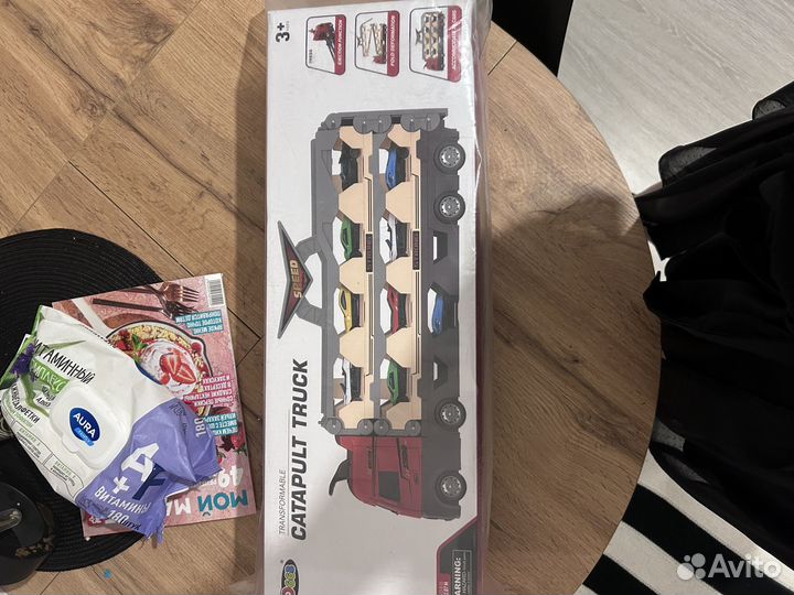 Игрушка грузовик катапульта