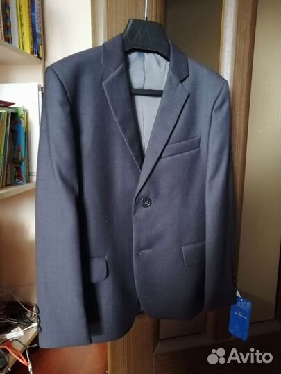 Школьный костюм для мальчика 128 серый