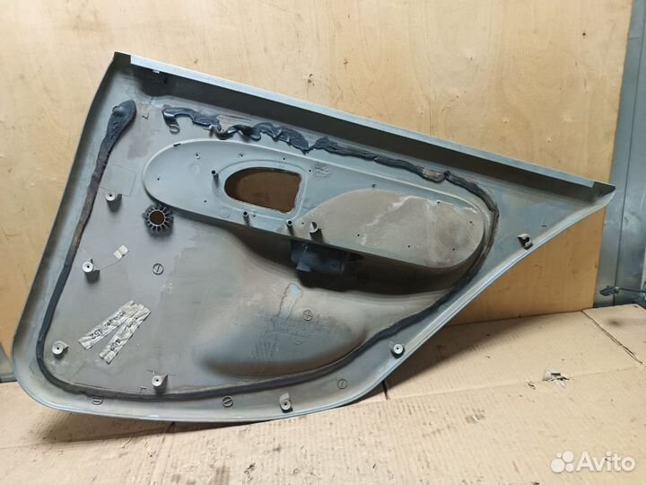 Обшивка двери задней левой Renault Symbol