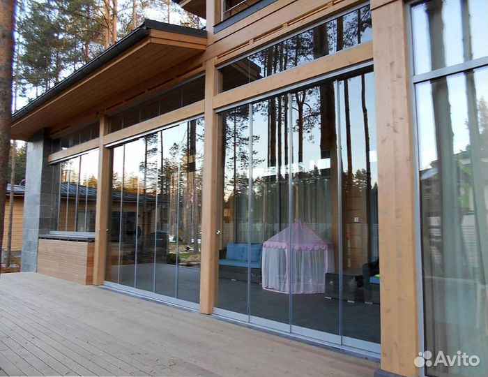 Безрамное раздвижное остекление