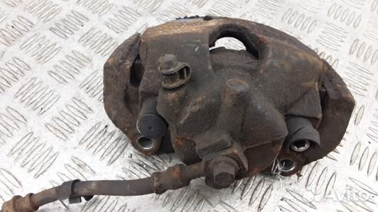 Суппорт тормозной передний левый opel astra H (DNI