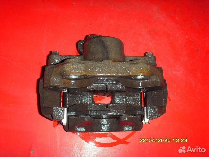 Суппорт тормозной передний левый Volkswagen Polo