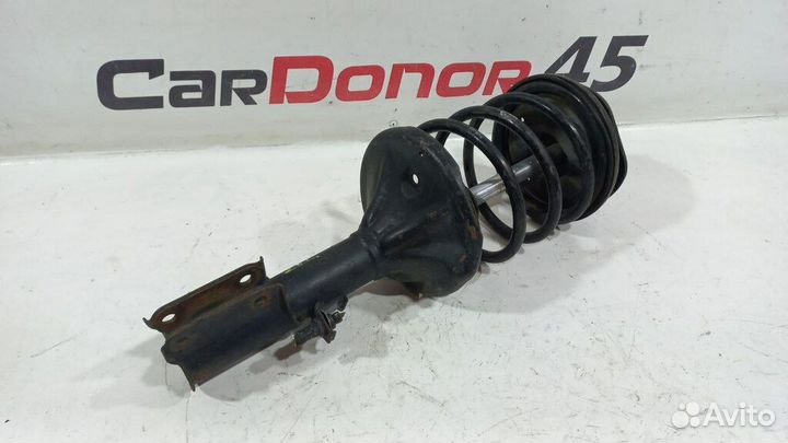 Амортизатор в сборе передний лев./прав. б/у для Mi