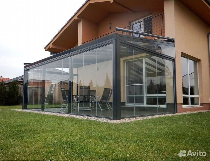 Безрамное раздвижное остекление