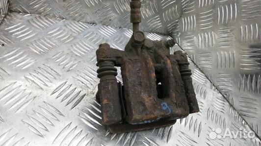 Суппорт тормозной задний левый toyota corolla E12