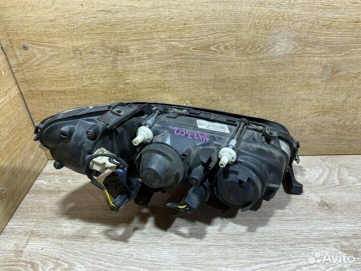 Фара левая Opel Omega B рестайлинг 142302