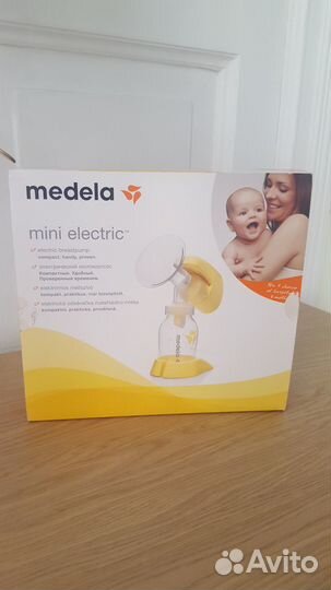 Молокоотсос medela электрический