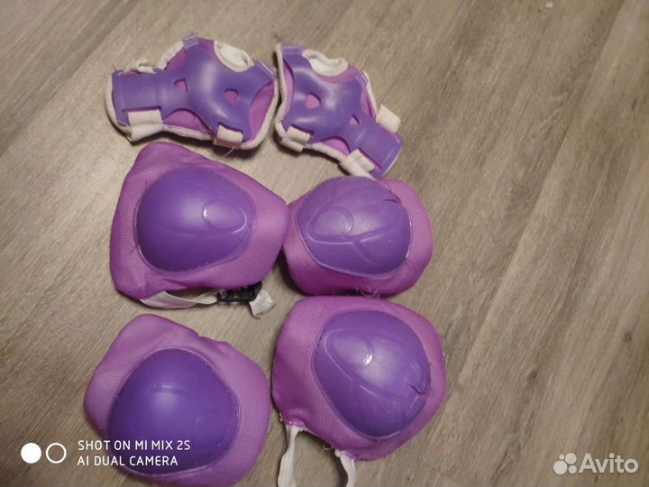 Роликовые коньки