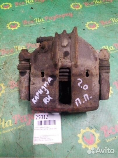 Суппорт передний правый Mitsubishi Carisma седан