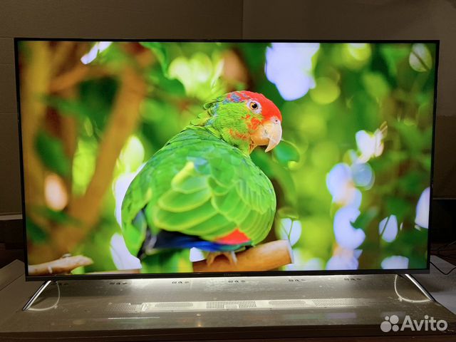 Новый большой богато оснащенный телевизор 65 дюйм