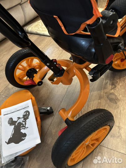 Детский трехколесный велосипед с ручкой