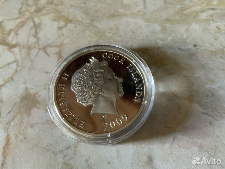 Монета трансформер 10 долларов 2009 года